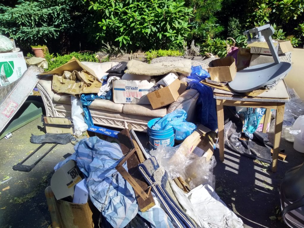PDX Junk Removal & Hauling Truck and Heavy Trailer on a Job Site in Portland